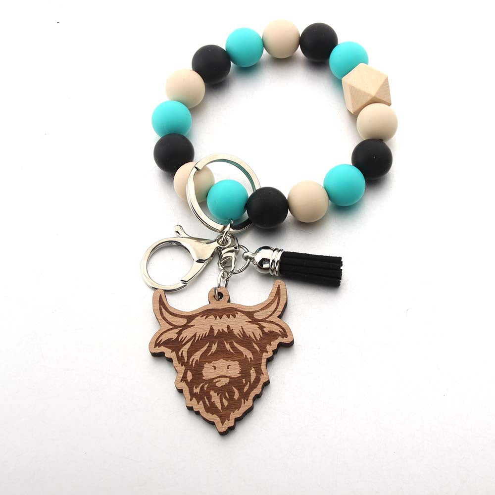 Wholesale Cartoon Western Cowboy Tassel Laser Bull Head Beaded Keychain
